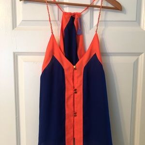 Blue and orange tank top with gold buttons